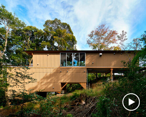 OHArchitecture embeds stepped camma villa and office onto sloping site in otsu, japan