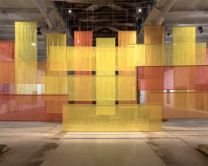 dana awartani visualizes gaza's devastation at venice art biennale through layers of dyed silk