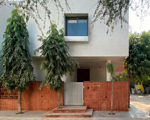 red sandstone jali lattice encloses jaipur house's facade by nuar studios