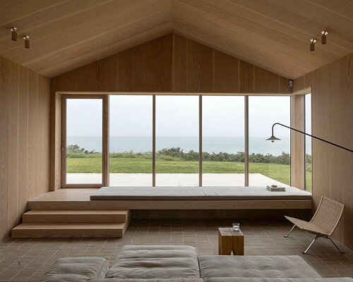 norm architects reinvents the danish summerhouse with its heatherhill beach house