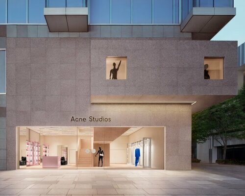 acne studios' signature flamed pink granite envelops beijing sanlitun flagship store