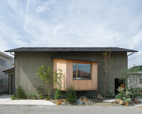 a viewing room playfully protrudes from tetra works' rental villa in hiroshima