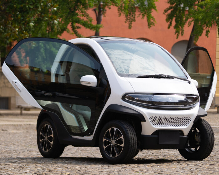 electric microcar ‘eli ZERO’ has transparent glass doors and trunk space for two carry-ons