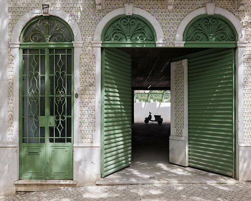 studio fragmentos revives lisbon townhouse, restoring its floral-painted facade