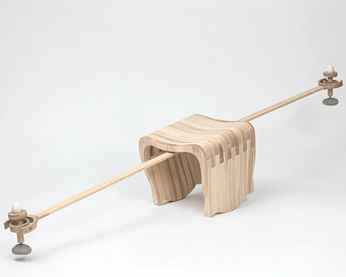 ahn kihyun’s playfully performative chair is intersected by a gimbal structure to balance eggs