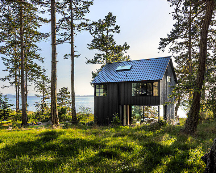 heliotrope architects' cabin lookout opens broadly onto lopez island's pacific shores