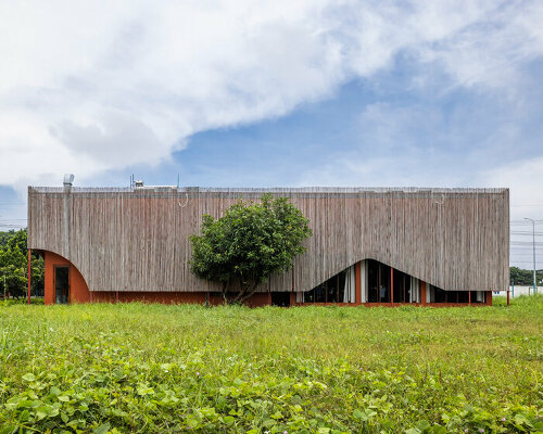 bamboo skin shades over nhà tú garden restaurant's outer dining space in vietnam