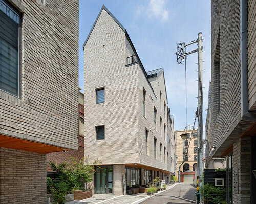 korean co-living develops within brick-clad building complex by urban agency