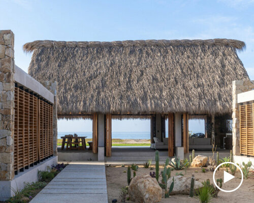 stone walls and palm-thatched palapas blend tate house into the oaxacan landscape