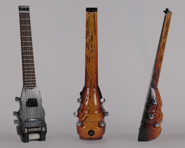 travel electric guitar with ukulele body and 3D printed parts can be packed in hand luggage