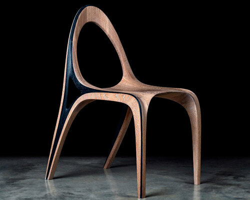 fluid convex and concave shapes take the form of wooden aria chair