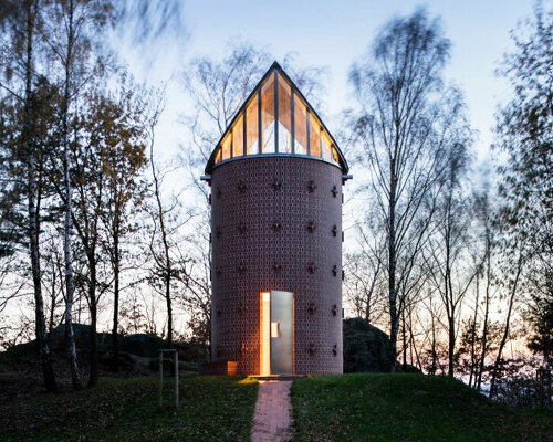 atypical gable roof replaces dome frescoes in czech brick-covered chapel