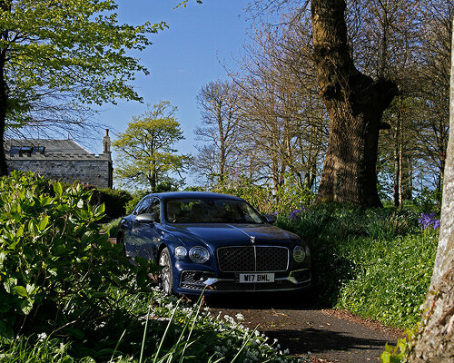 bentley flying spur mulliner W12 powers elegant design at speed