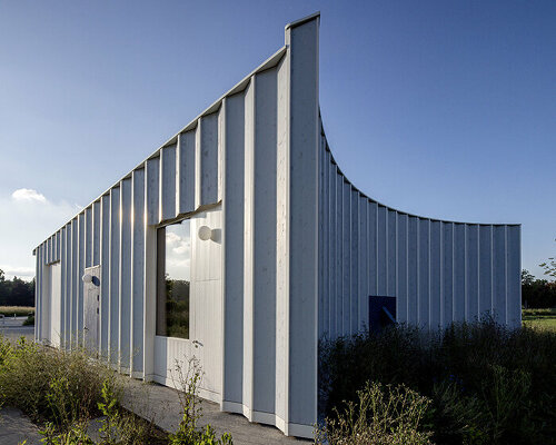 daniel holfeld captures gardeners house's pleated facade by cabinet studio in geneva