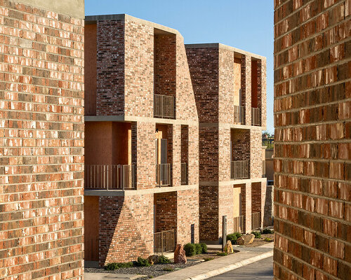 stepped brick-clad volumes and terraces outline DVS 03 residential complex in mexico