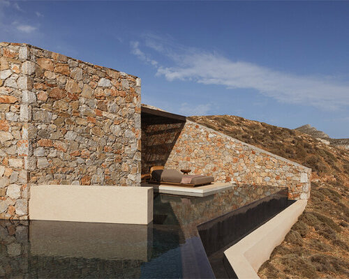 block722's gundari resort gently carves through the folegandros cliffs in greece