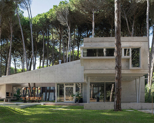 triangular concrete wedge shelters estudio galera's kairos house in argentina