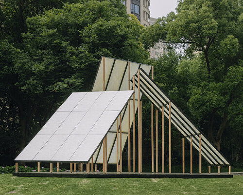 translucent panels of galaxy arch's installation cast warm glow across park in china