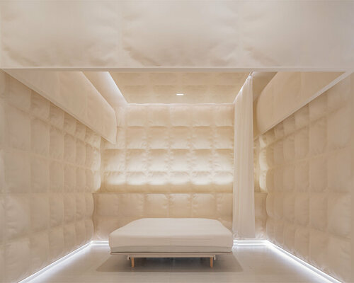 glass-reinforced concrete 'pillows' envelop this experience mattress store in shanghai