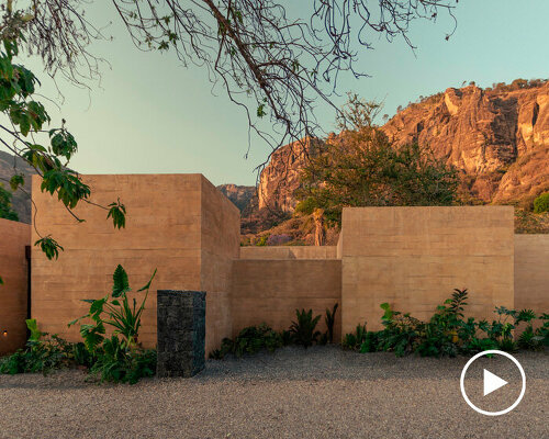 RA! sculpts monolithic house emerging from the rocky tepozteco cliffs in mexico