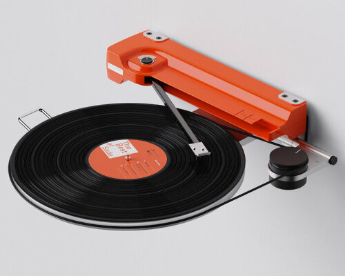 vinyl records hover in oscar olsson’s fully automatic, wall-mounted turntable ‘disco volante’