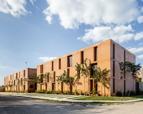 chukum, stone, and rhythmic openings shape mexican housing complex by P11 arquitectos