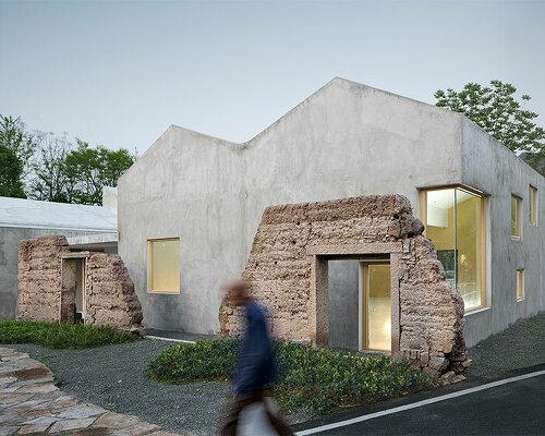 villager's home by UAD grows out of ancient mud house remnants in rural china