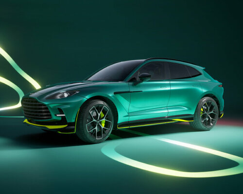 aston martin rolls out the ‘supercar of SUVs’ with lime lines as homage to its F1 race vehicle