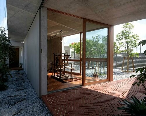 studio cochi architects extends a tomigusuku home with a modern studio space