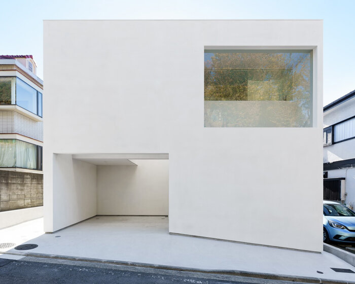 'light garden' atriums dot all-white wooden shell in japanese residence