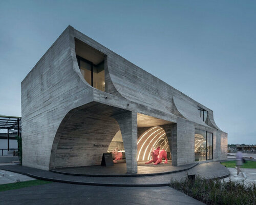 cathedral-like concrete arches punctuate TOUCH architect's french kitsch III café in thailand