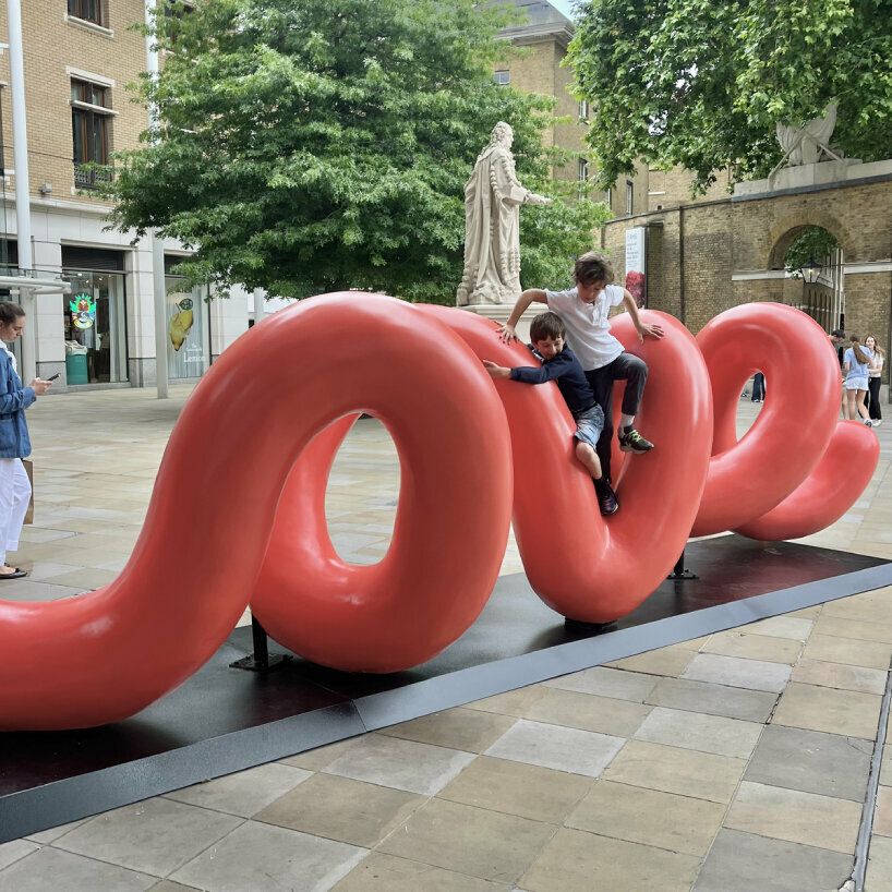 yoni alter's climbable sculpture in london reveals the word 'love'