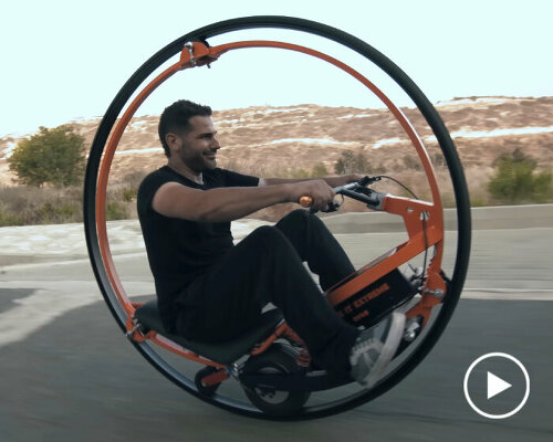 life-size custom electric monowheel made of motorcycle tires can balance itself as it glides