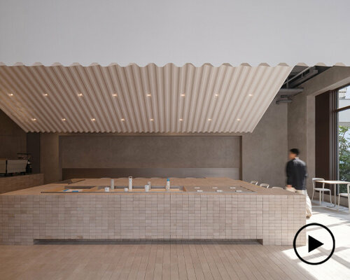 neri&hu suspends imprint of corrugated roof inside blue bottle coffee's shanghai branch