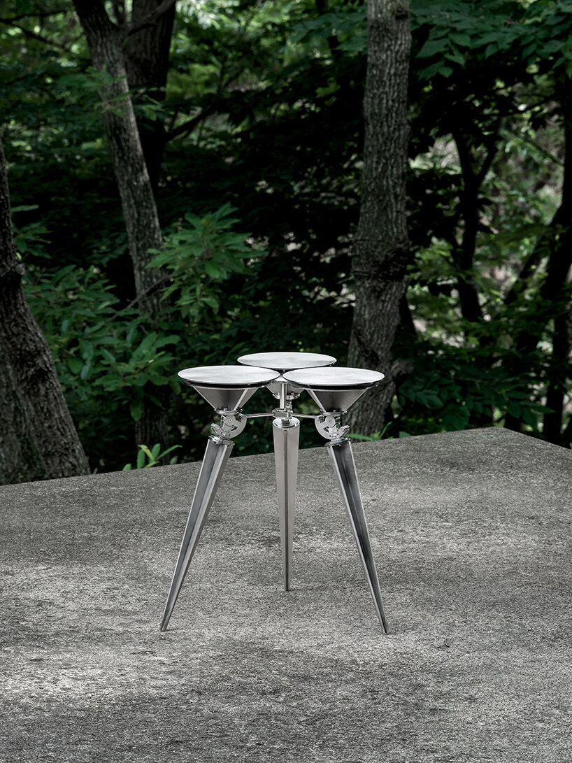 terrain-adaptive cone stool by sukchulmok studio reinterprets common  landscape pegs