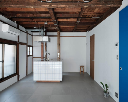 ROOVICE infuses blue accents in 60-year-old tokyo home makeover