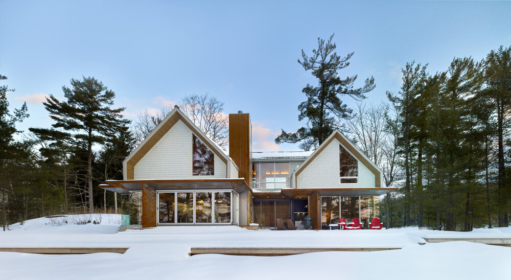 undulating shoreline envelops six mile lake cottage by BLDG workshop