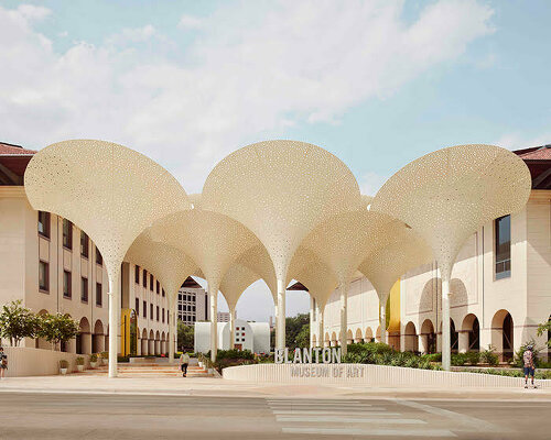 snøhetta's revised landscaping encircles arched petal canopy in austin's blanton museum