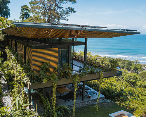 'weightless' timber rooftop shades studio saxe's latest residence in costa rica