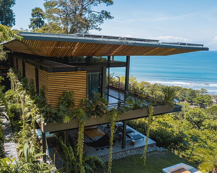 'weightless' timber rooftop shades studio saxe's latest residence in costa rica