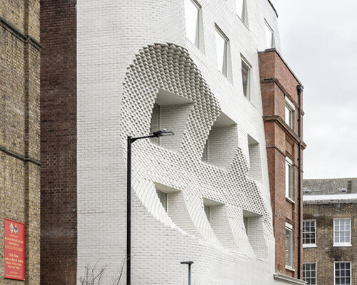 corstorphine & wright carves striking semi-circular void on office building in london