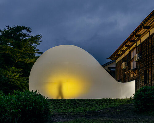 MAD architects' biomorphic installation in japan gently bubbles out from century-old house