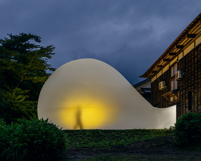 MAD architects' biomorphic installation in japan gently bubbles out from century-old house