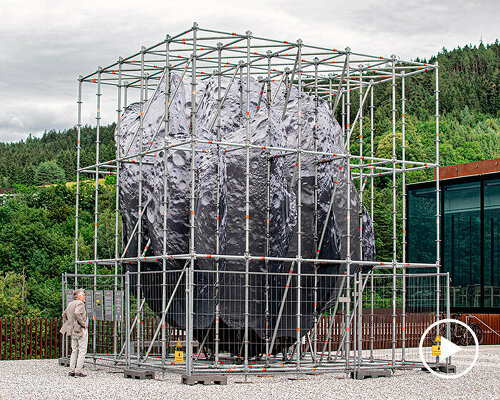 thomas medicus' public installation encloses 3D asteroid in cuboid scaffolding