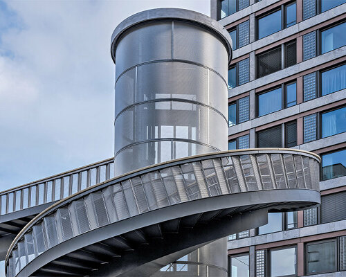 industrial negrelli footbridge coils and stretches above zürich's dense railway network