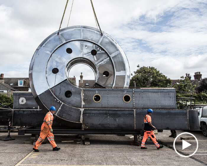 interview: alex chinneck brings a massive, looping steel boat to sheffield's historical canal