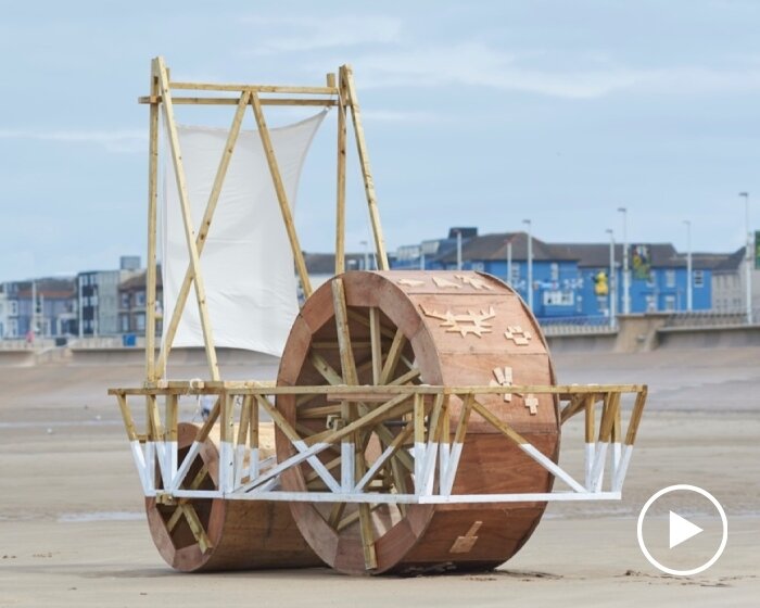 futurefarmers' wooden beachship rolls along blackpool coastline inviting collaboration