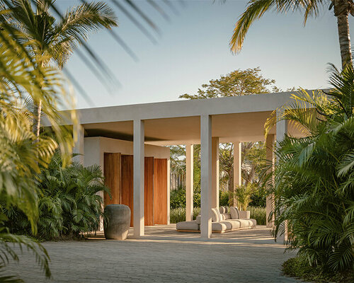 concrete, wood, and vegetation intertwine within brandilera house in nayarit