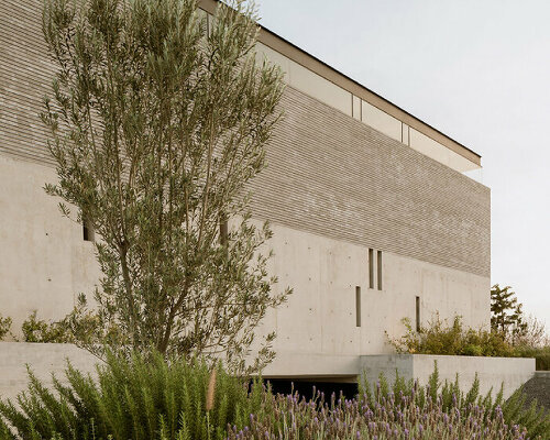 concrete blocks with grid-like interventions wrap laboratorio de arquitectura’s mexico house