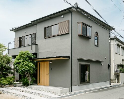 double-level foyer puts modern twist on traditional japanese doma in house in itama